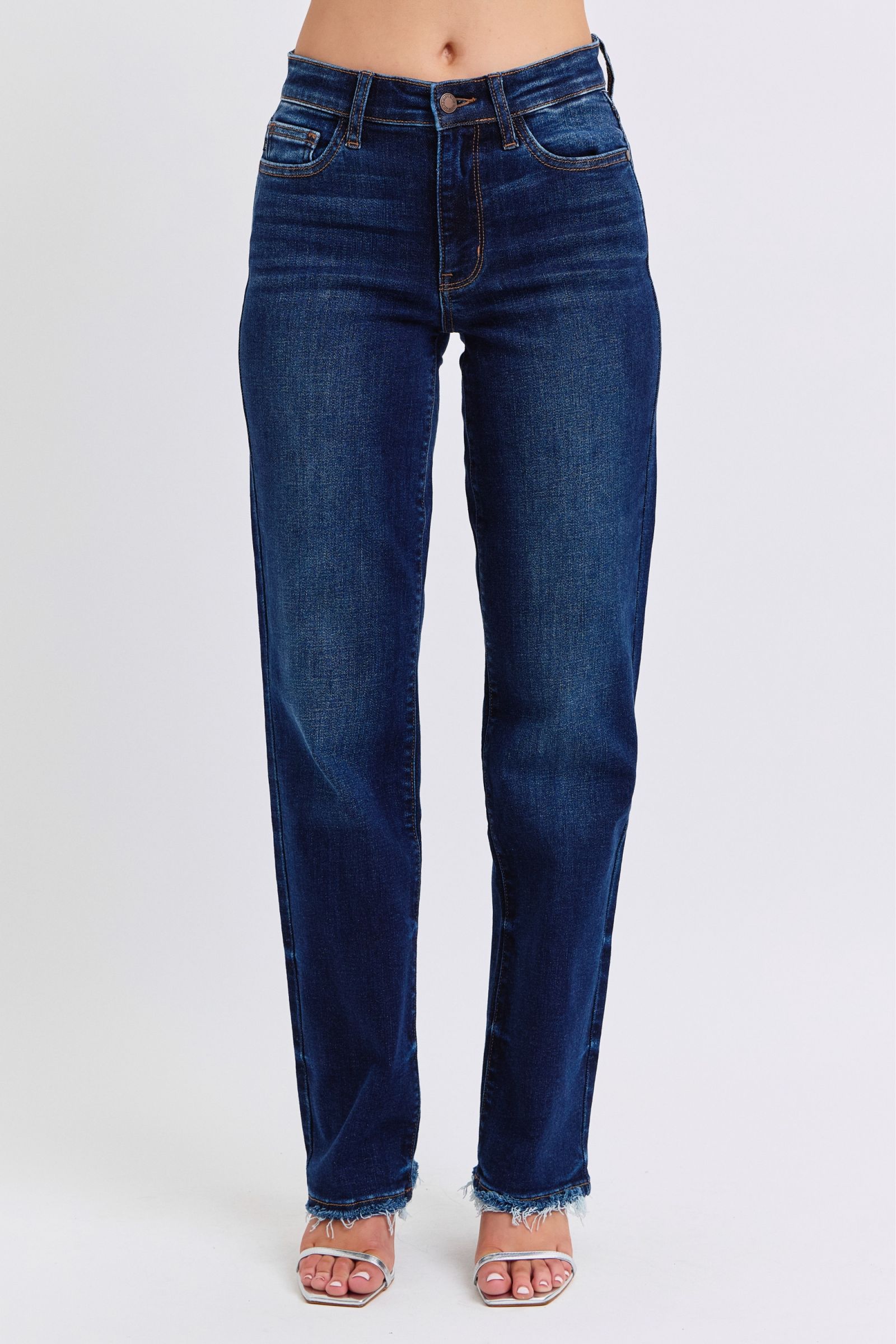 Judy Blue Polly Raw Hem Straight Leg Jeans in dark wash, featuring a mid-rise waist, raw hem, and slightly stretchy fit for a versatile, stylish look.