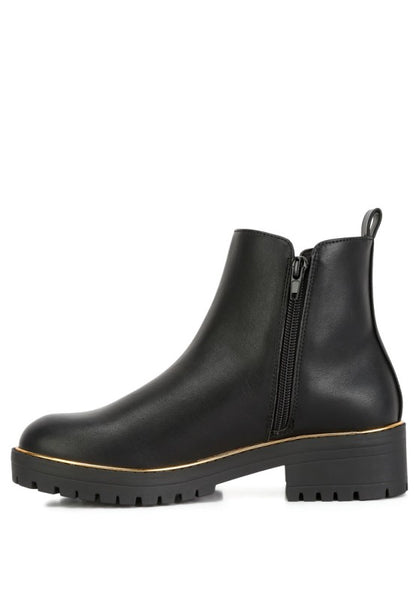 Side view of Black Thorin Block Heel Boots showing zipper closure and lug sole design.