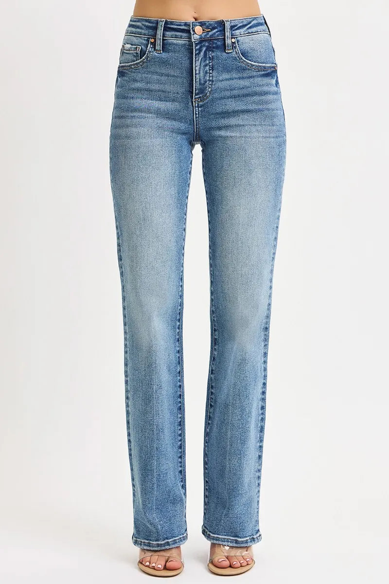 Front angle view showing tummy control waistband and classic straight leg silhouette in medium wash denim.