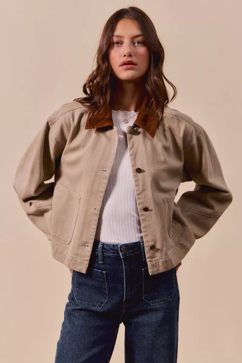 Suri Cotton Twill Cropped Barn Jacket featuring long sleeves and patch pockets.
