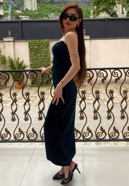 Model styled in black gown with black Yaga Slingback Stilettos highlighting elegant pointed toe and diamante strap