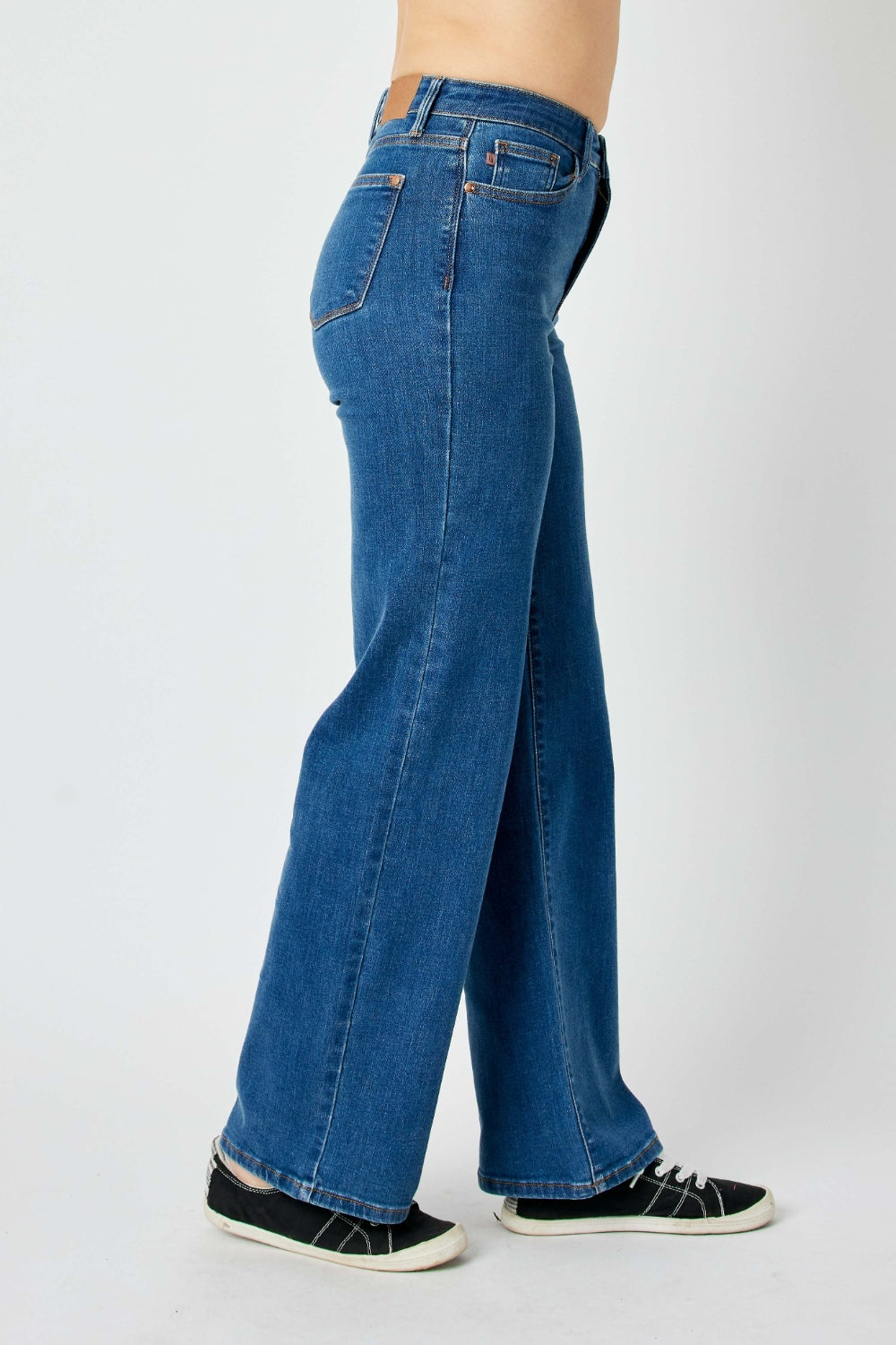 Judy Blue high-rise straight leg jeans in a medium wash with moderate stretch.