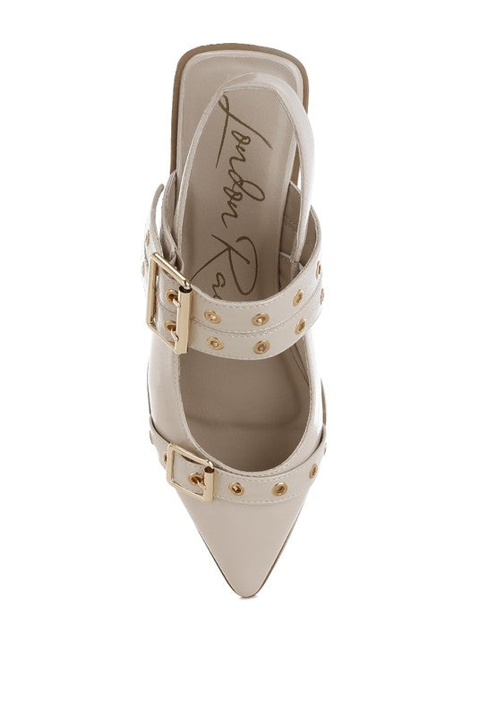 Beige flats with a pointed toe, adjustable buckle straps, eyelet detailing, and a slingback design. Features a cushioned insole and 1-inch flat heel for comfort.