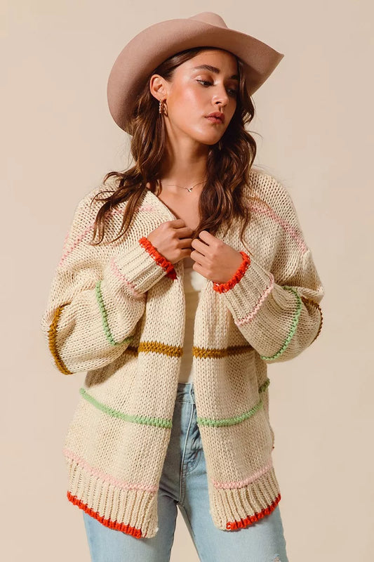 Front view of Angelina Cardigan in oatmeal with red, pink, mint, and brown stripes.