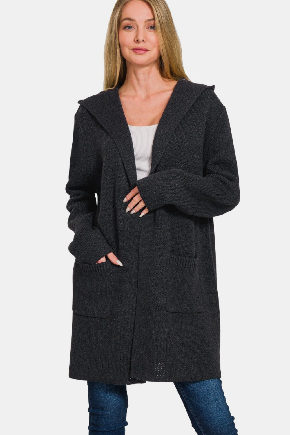 Black woman's cardigan with a hood, long sleeves, and an open front. Features pockets and a slightly stretchy fabric.