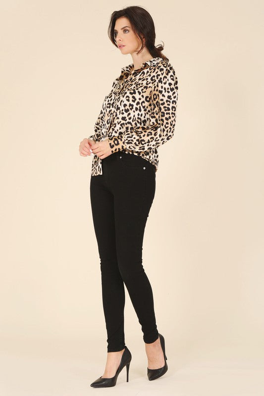 Leopard print satin blouse with a shirt collar, long sleeves, and button-down closure.