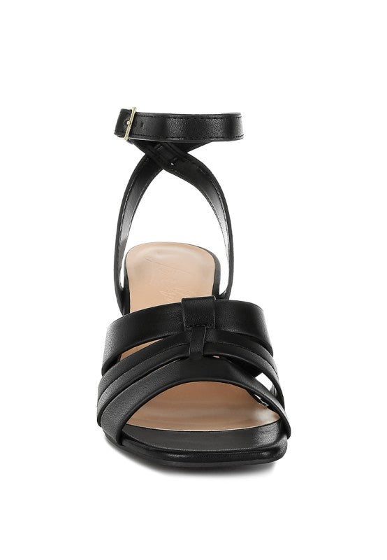 Front view of black Signora Ankle Strap Sandals with cushion insole detail.
