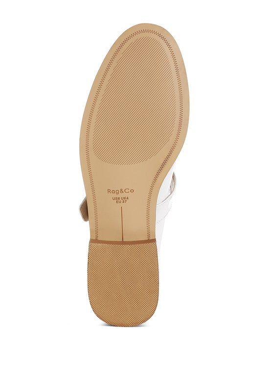 White Swenson Mary Jane Loafers bottom view, durable rubber sole with grip detail and low heel