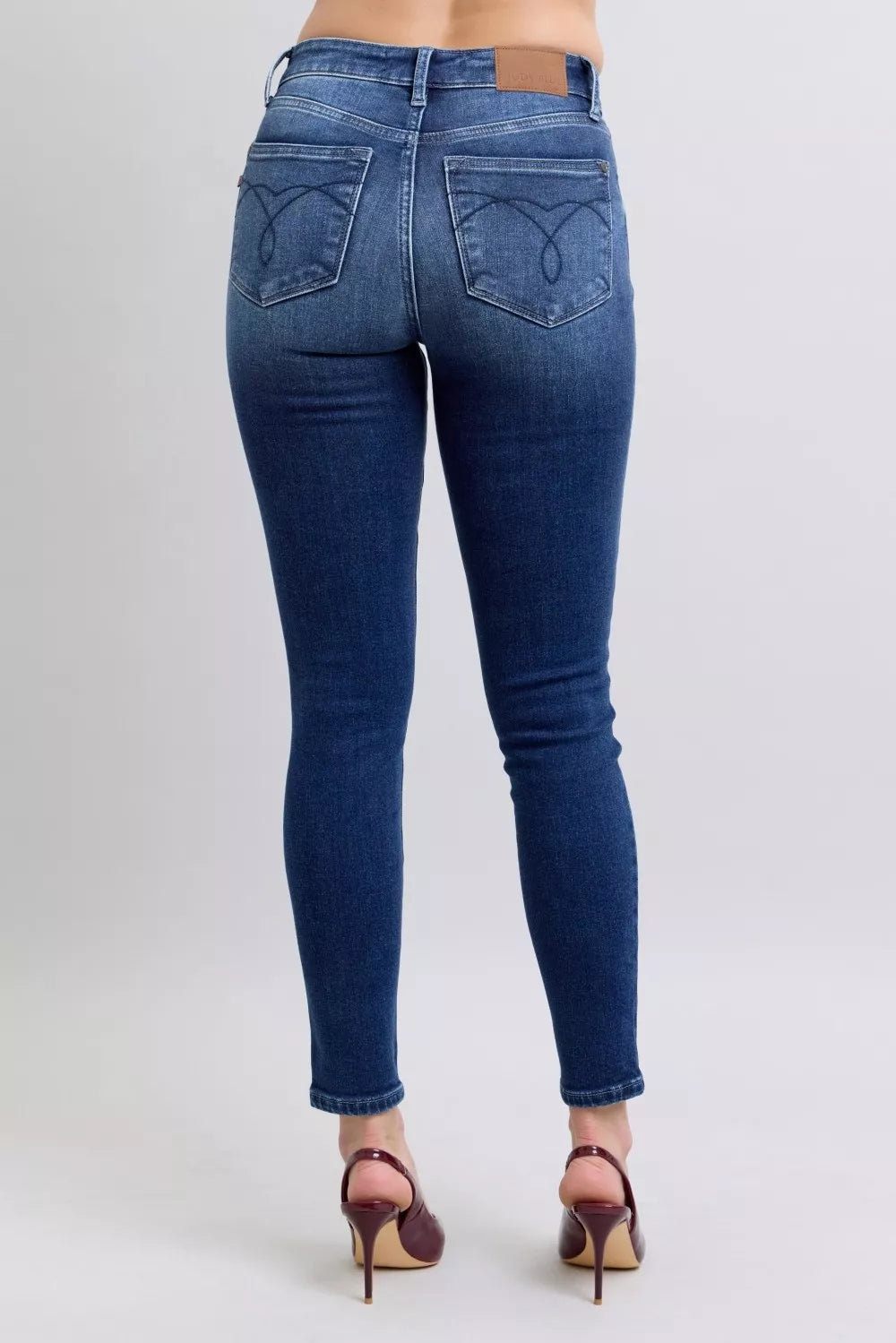 Back view of Glenda Washed Thermal Skinny Jeans highlighting flattering pockets and slim fit.