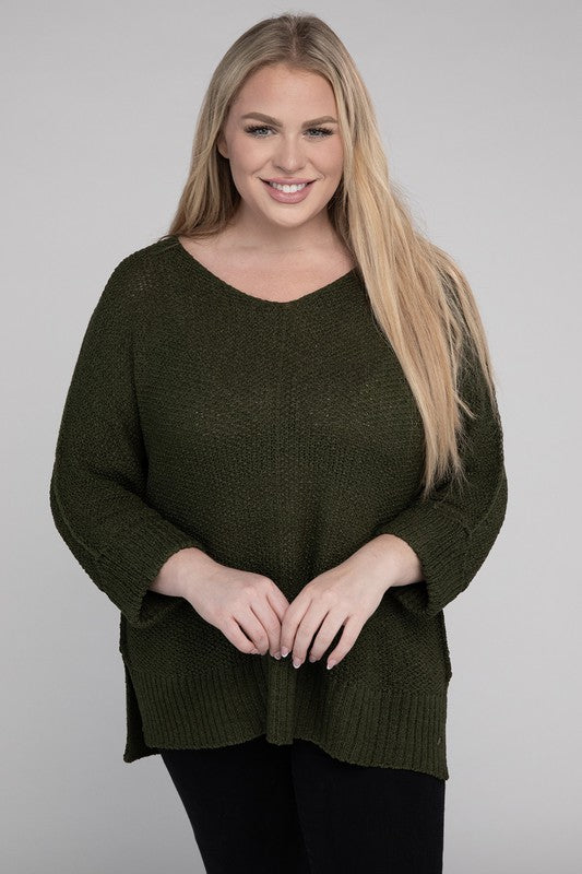 Olive green plus size crew neck sweater with a loose fit, long sleeves, and a cozy knit fabric for warmth.