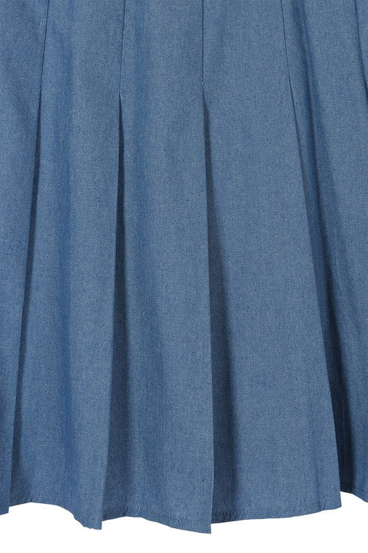 Blue high-waist, pleated, mini tennis skirt, with back zipper closure.