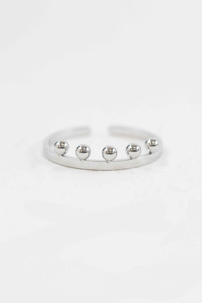 Top view of Bump Adjustable Ring in silver with ball charm accents