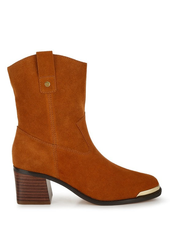 Profile of tan Emberly boots showing square toe, flared heel, and metallic toe guard.