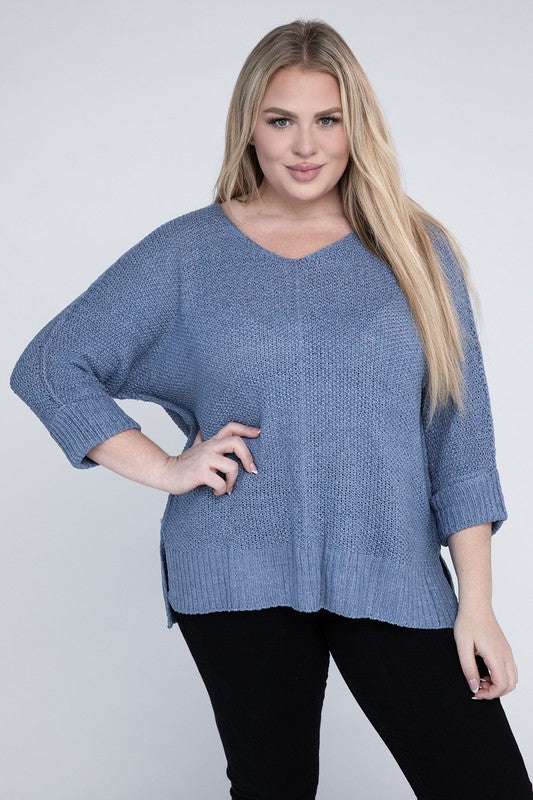 Periwinkle plus size crew neck sweater with a loose fit, long sleeves, and a cozy knit fabric for warmth.