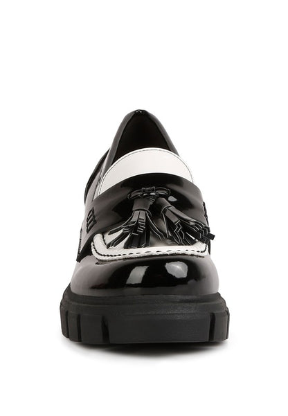 Front view of Jonah Platform Loafers in black and white with rounded toe design
