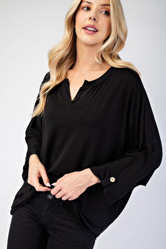 Black blouse with a notched neckline, three-quarter length sleeves, and slightly stretchy fabric.