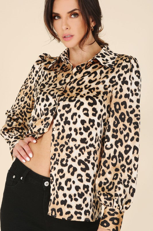 Leopard print satin blouse with a shirt collar, long sleeves, and button-down closure.