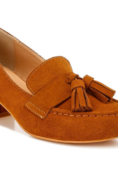 Close-up of Tan Ziva Suede Loafer Heels showing tassel accents and suede finish.