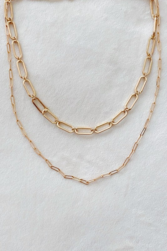 Flat lay view of Big & Small Double Chain Link Necklace with layered gold chains