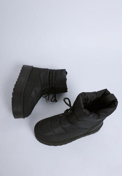 Top view of black Pacos Snow Boots with closed round toe and nylon finish.