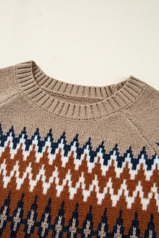 Close-up of Aztec knit pattern on Eva Crew Neck Sweater fabric.