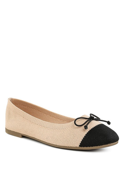 Front angle view of Rosario Two Tone Ballerinas in beige with black cap toe