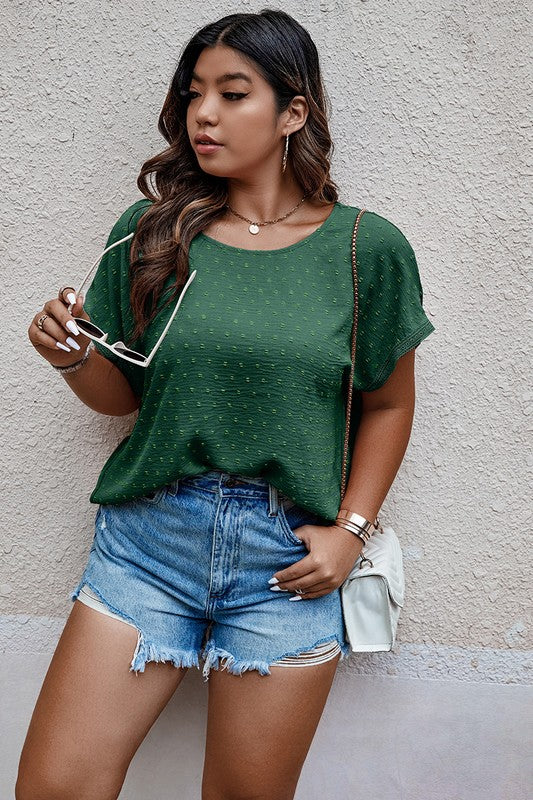 Tawny Plus Size Swiss Dot Blouse in green with button-back detail, short sleeves, and relaxed round neck fit.