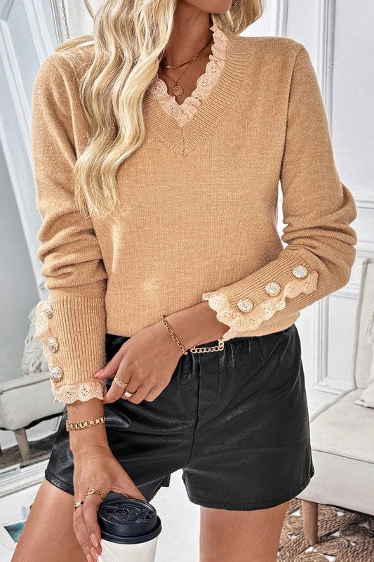 Front view of Phoenix Pullover in khaki styled with lace detail and button accents