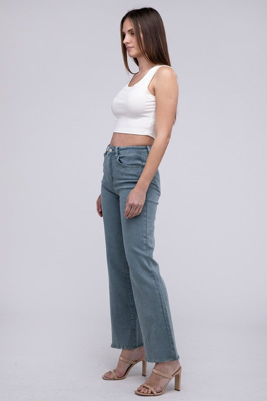 Teal acid-washed straight wide-leg pants featuring a frayed cutoff hem, zip fly closure, and a relaxed fit. Made with stretchy fabric for comfort and a unique vintage-inspired look.