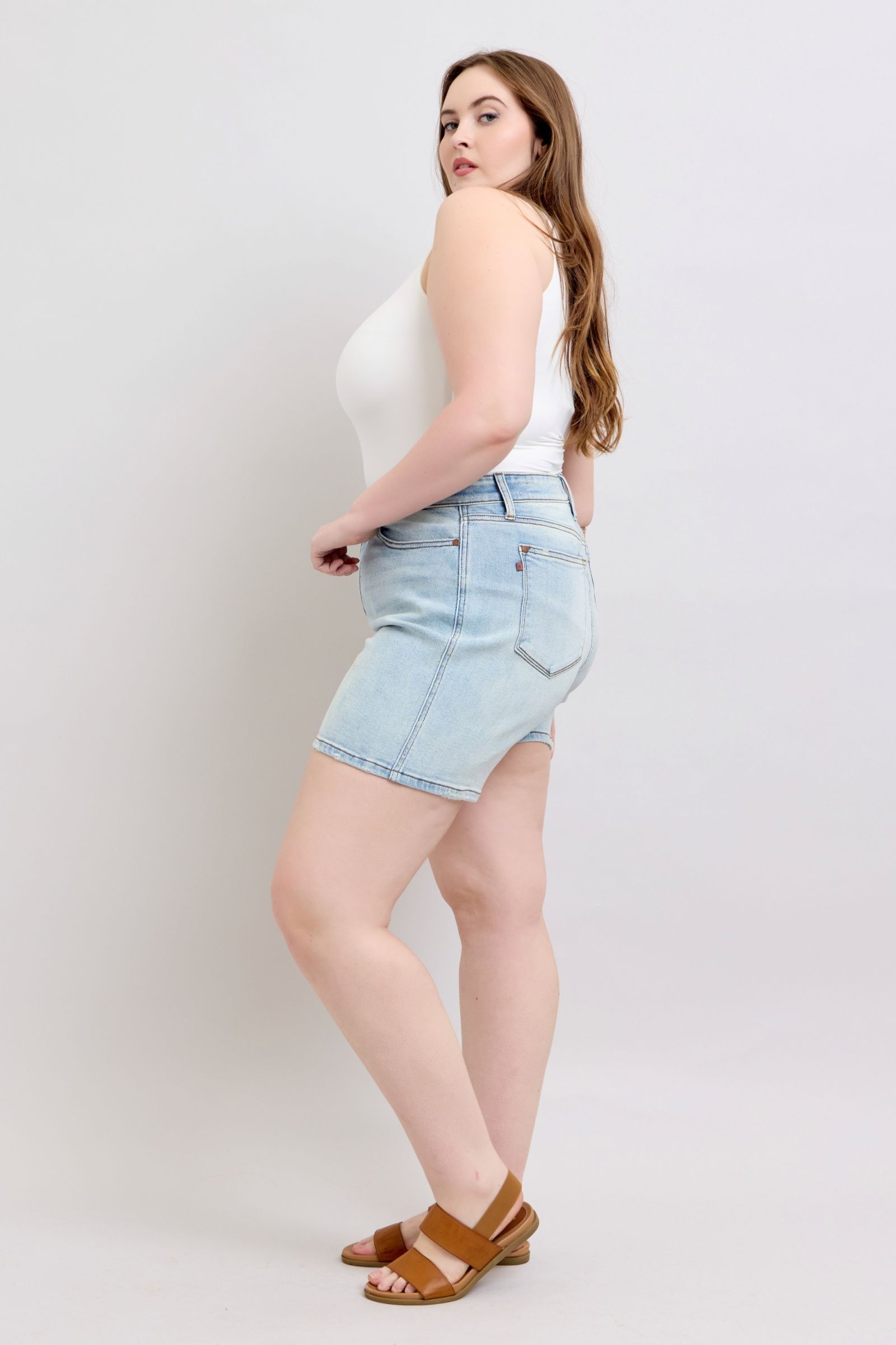 Plus-size front view of Hannah Judy Blue Shorts in light wash with double-button detail.