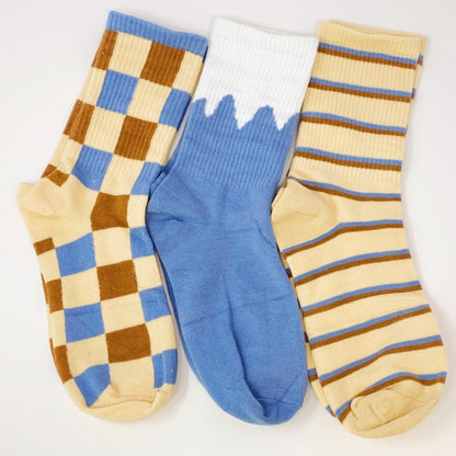 Flat lay of all three Trendy Pattern Trio Socks together side by side.