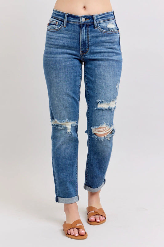 Front view of Flora Distressed Boyfriend Jeans by Judy Blue, featuring rolled cuffs, distressing on knees and front pocket, in a vintage medium wash denim.