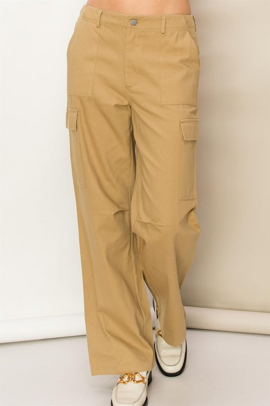 Khaki high-waisted cargo pants with a straight-leg fit, functional side pockets, and zip fly.