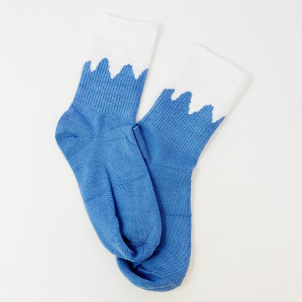 Pair of blue snow-capped Trendy Pattern Socks with white cuff detail.