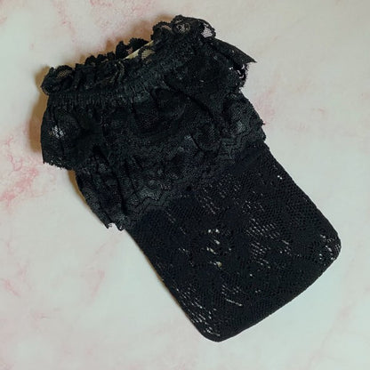 Folded black 80’s Lace Socks highlighting vintage lace ankle detail and stretch design.