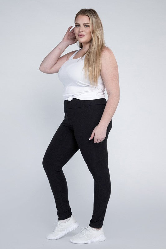 Full-length curvy plus leggings in black with a high-rise thick waistband, fitted silhouette, and convenient leg pockets.