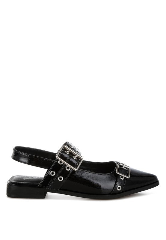 Black flats with a pointed toe, adjustable buckle straps, eyelet detailing, and a slingback design. Features a cushioned insole and 1-inch flat heel for comfort.