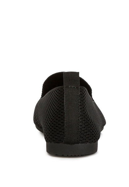 Akili Knit Textile Solid Flats in black, back view highlighting pull tab