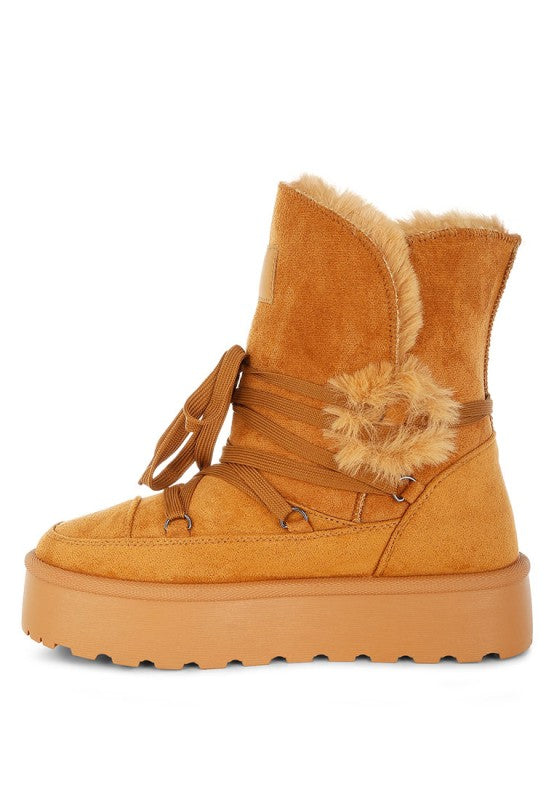 Side view of Tan Noaya Chunky Faux Fur Snow Boots showing microfiber upper and lug outsole.