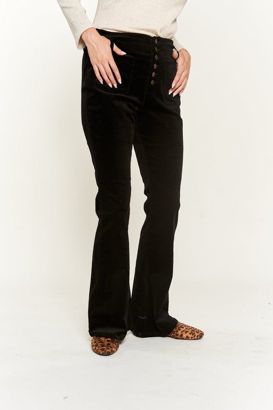 Front view of Taran Corduroy Flare Pants in black showing flared silhouette and stretch fit