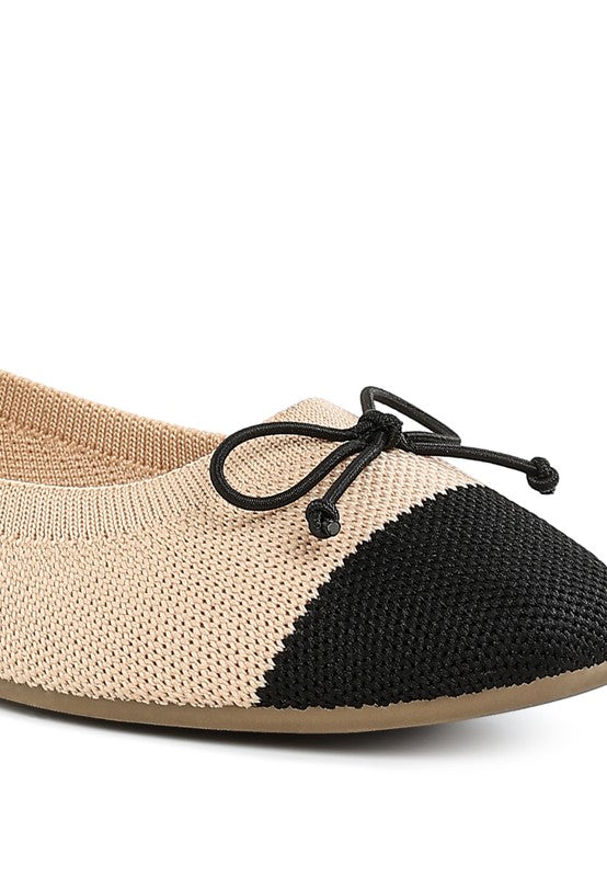 Close up of Rosario Two Tone Ballerinas in beige and black showing bow detail