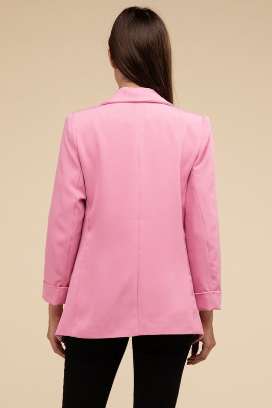 A candy pink woven blazer with a lapel neckline, long sleeves, and an open-front design. Features front pockets and a regular fit.