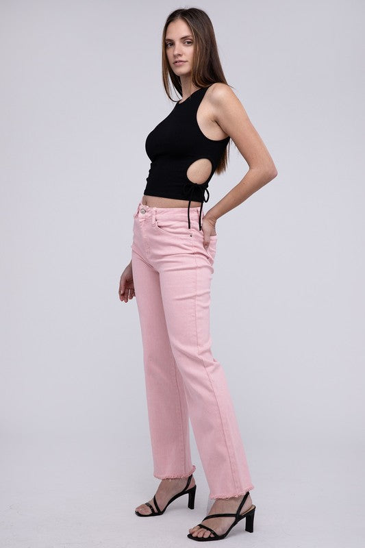 Pink acid-washed straight wide-leg pants featuring a frayed cutoff hem, zip fly closure, and a relaxed fit. Made with stretchy fabric for comfort and a unique vintage-inspired look.