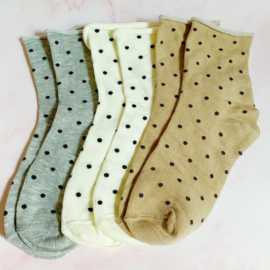 Flat lay of all three Precious Polka Dot Socks pairs in sage, cream, and beige.