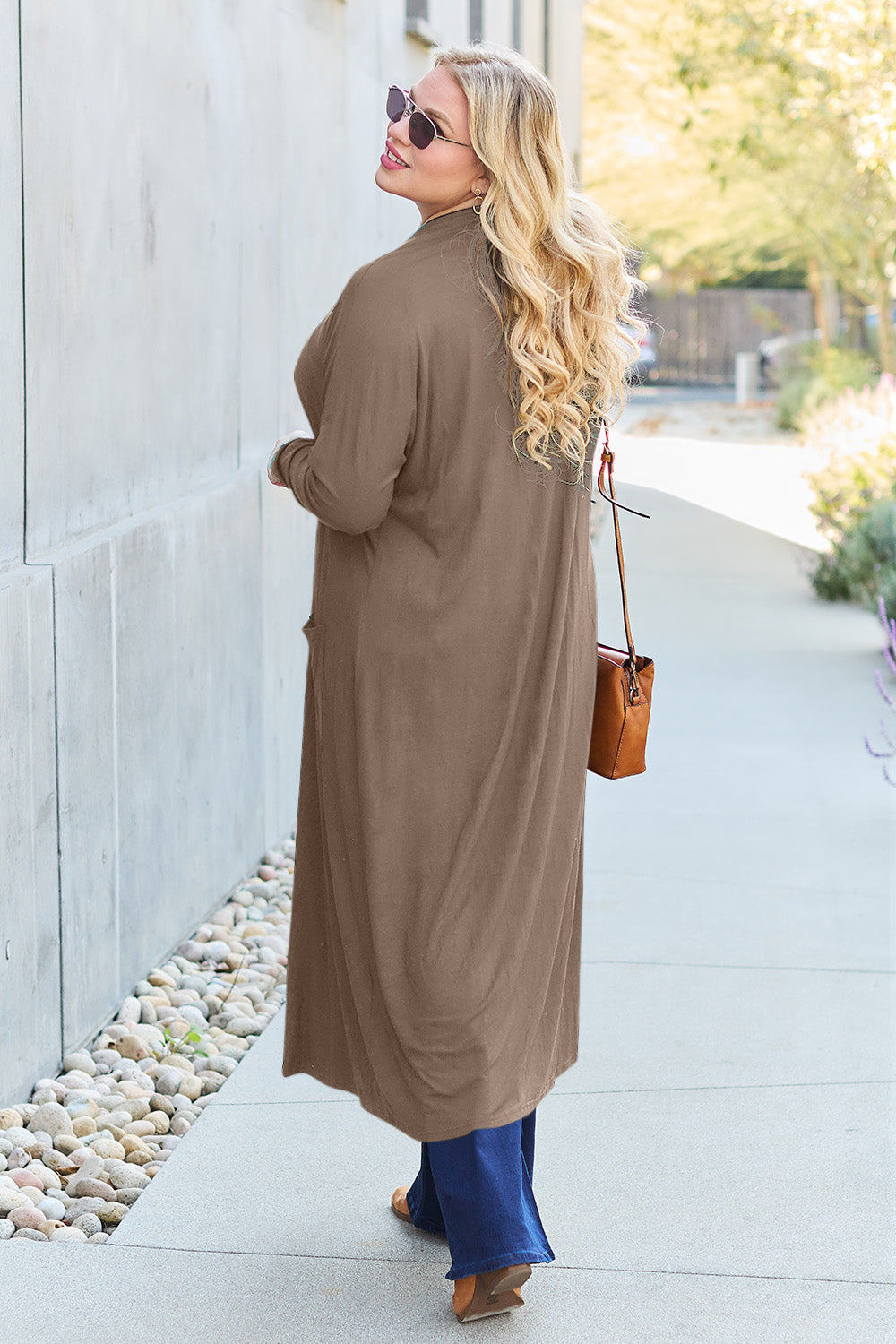 Mocha open-front long-sleeve cover-up with a flowy design and pockets, perfect for layering on breezy days.