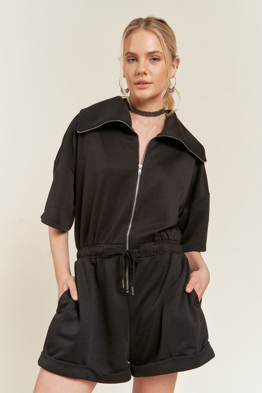 Clover Plus Size Terry Zip Front Romper in black with high neck and drawstring waist.