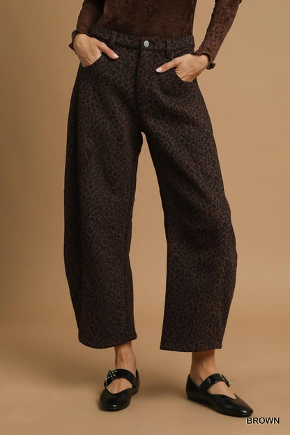 Front view of Finley leopard print pants showing wide leg silhouette and bold pattern.