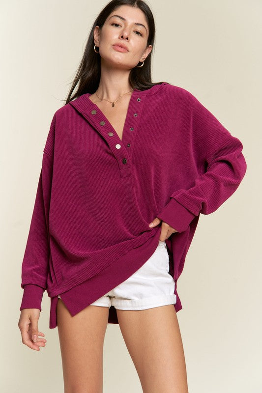 Kenzie Hooded Sweatshirt in Magenta front view showing bright ribbed knit and oversized silhouette.
