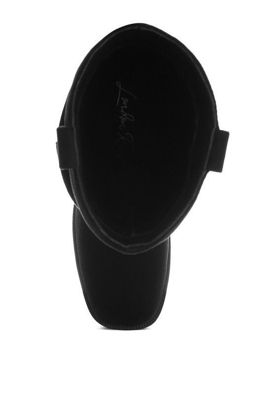 Top view of black Ottawa Slouchy Cowboy Boot opening showing interior lining.