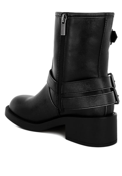 Black Caribou Boots back angle with pull tab, harness detail, and block heel.